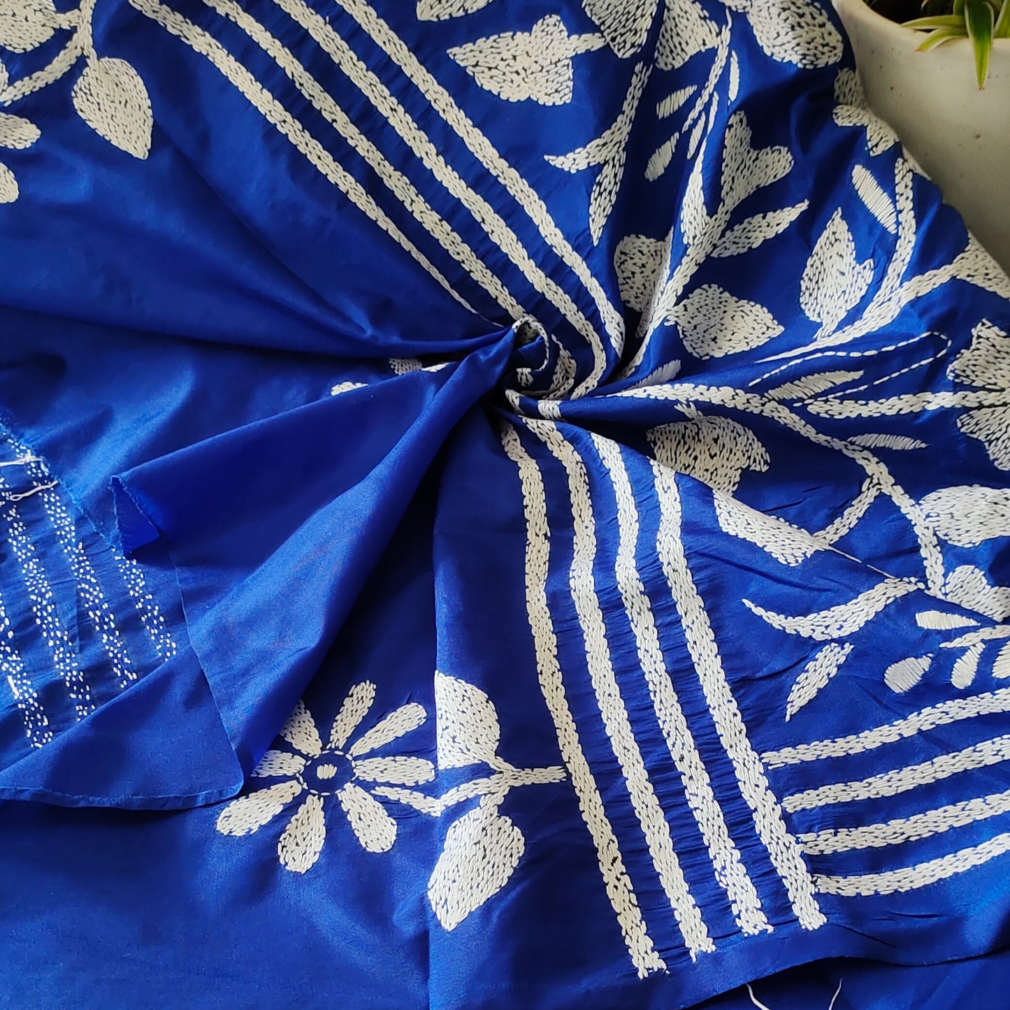 Regal Blooms: Royal Blue Kantha Saree with White Floral Embroidery